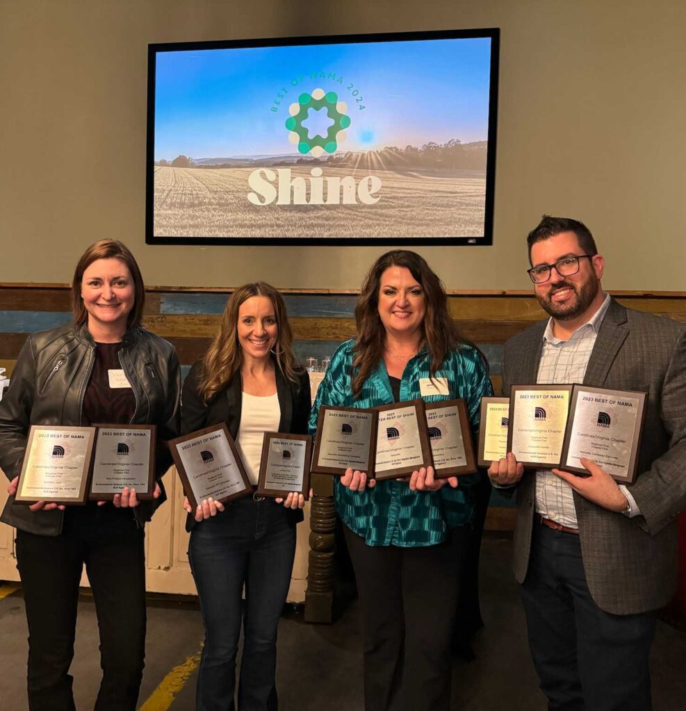 HLK Envu team holding NAMA awards