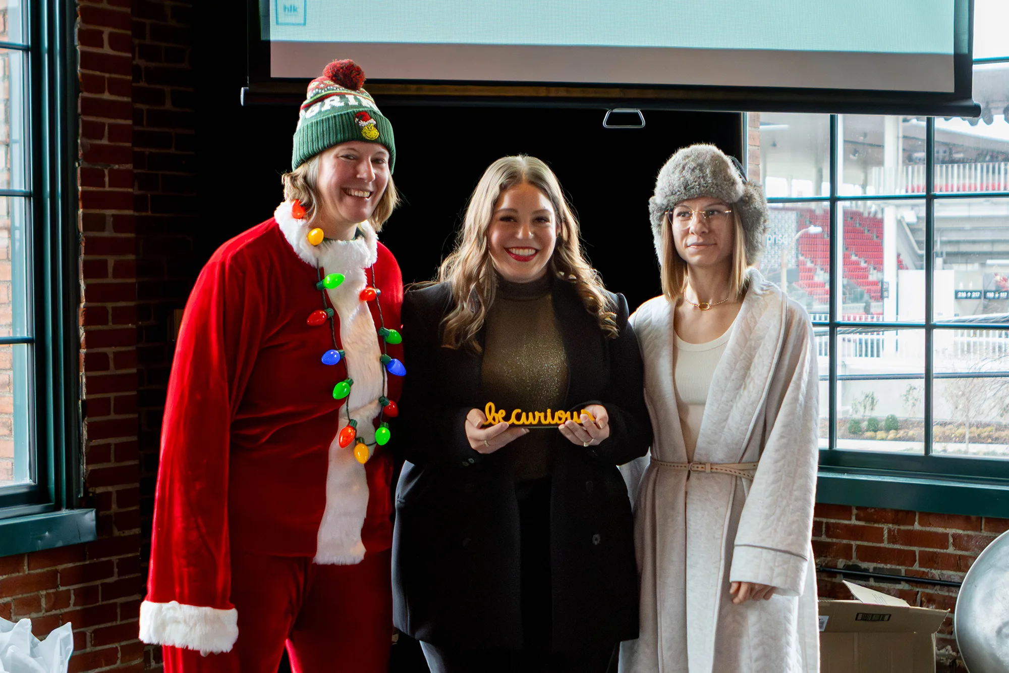 The three finalists for the "Be Curious" award. From left to right: Tina Ortinau - Group Account Director, Kristen Kaestner - Planner and Natalie Boesch - Quality Assurance Engineer.